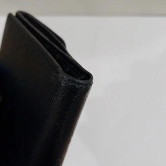 Authentic Salvatore Ferragamo Black Leather Bi-Fold Wallet – Luxury 4.75x4-inch